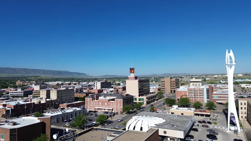 Casper cityscape under clear blue skies, with streets and modern buildings