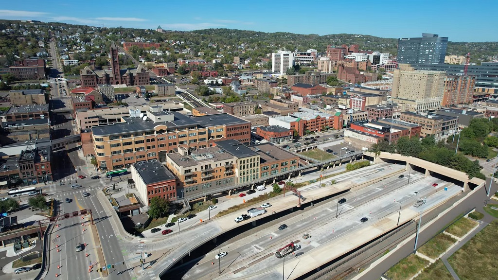 Aerial view of Duluth downtown with light traffic and clean air quality on a sunny day