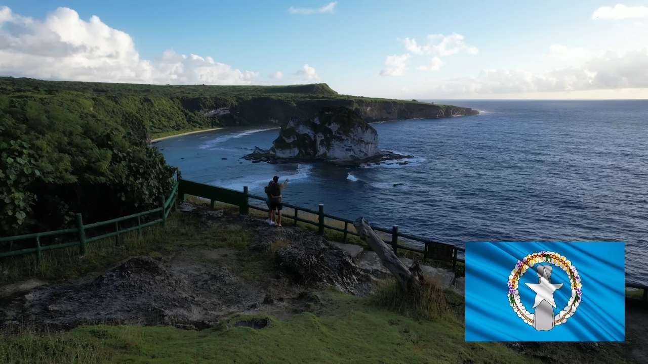 Panoramic coastal view with limestone cliffs and clear ocean on a remote Pacific island